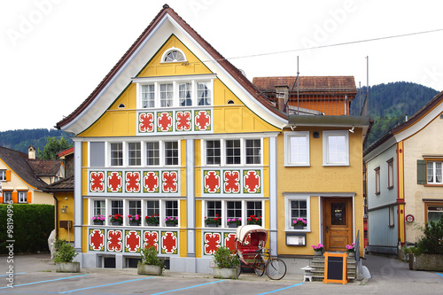 APPENZELL, SWITZERLAND- JUNE 29, 2015: Ancient unique colourful house in historic medieval old town. Appenzell is well-known for its colourful houses with painted facades.