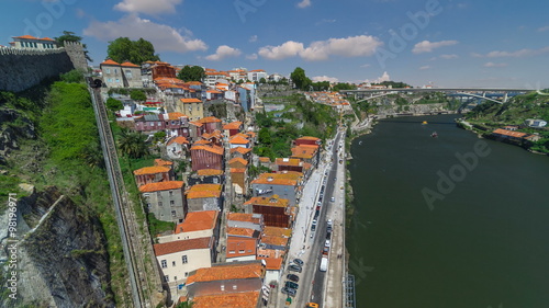 Aerial view of Funicular dos Guindais and picturesque houses in historic centre of Porto city timelapse, Portugal photo