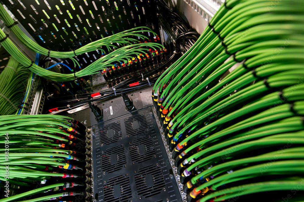 green wires connected to the network server StockFoto Adobe Stock