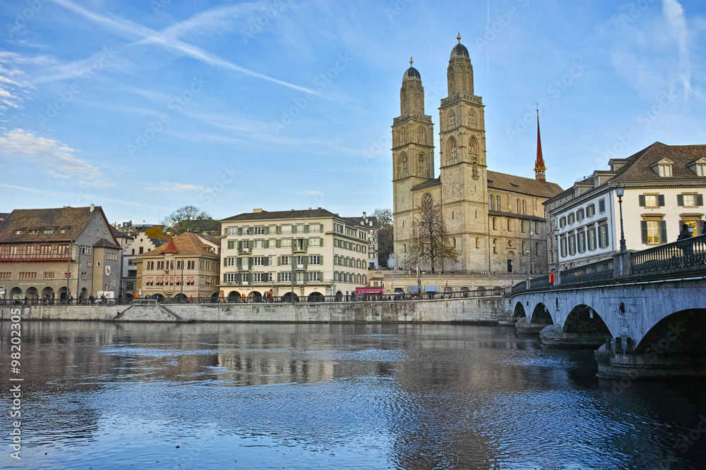 Church of Grossmunster and reflection in Limmat River, Zurich, Switzerland