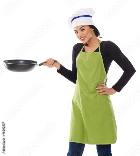 Hispanic lady cook with frying pan