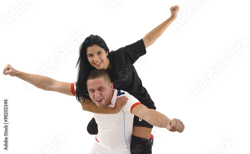 Woman and man happy by scorring goal photo