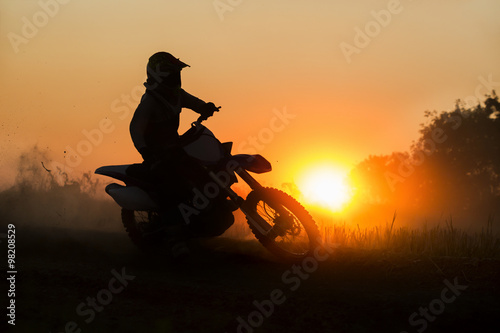 Fototapeta Naklejka Na Ścianę i Meble -  Silhouette motocross speed in track