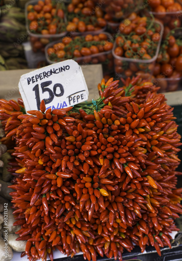 Fototapeta premium fruit and vegetable open air market in Italy - hot chili peppers