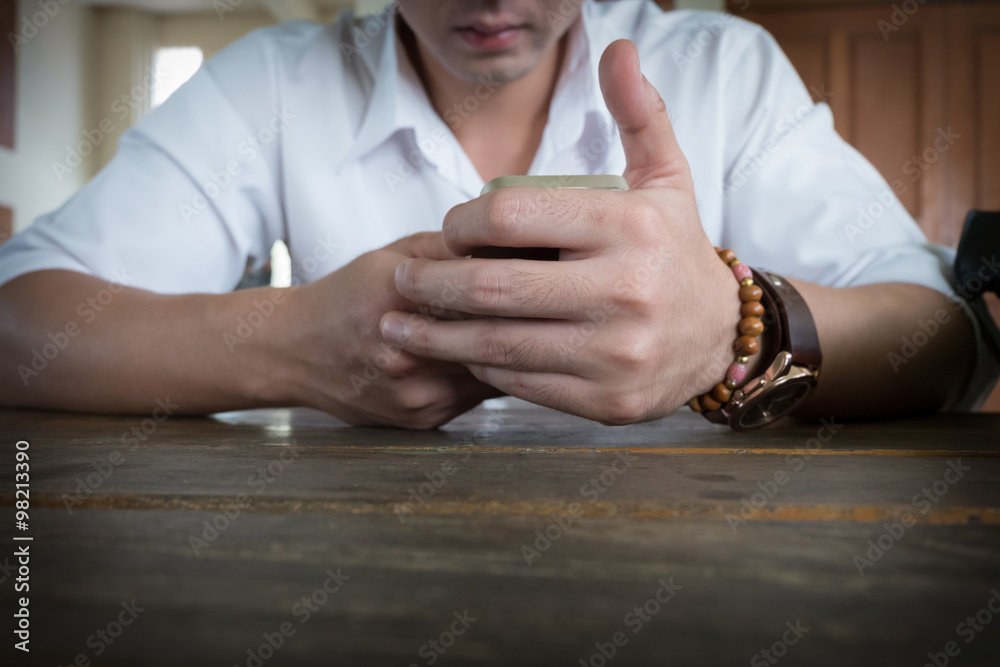 businessman using a mobile phone with texting message
