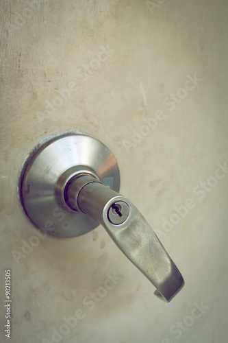 metallic steel knob door handle lock the old white door