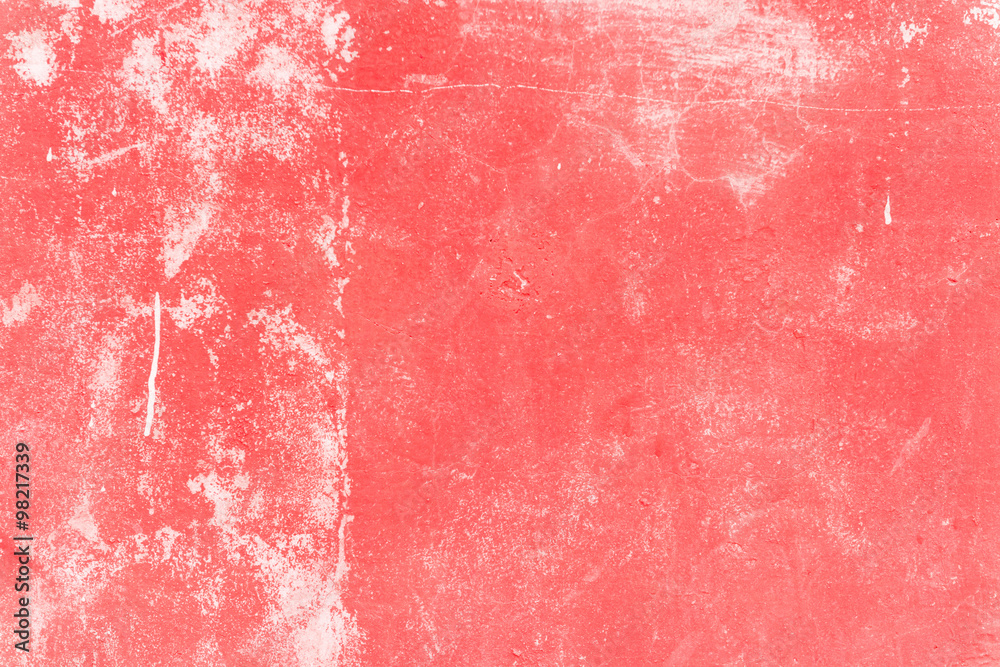 Fototapeta premium Scratched pink and white stone wall