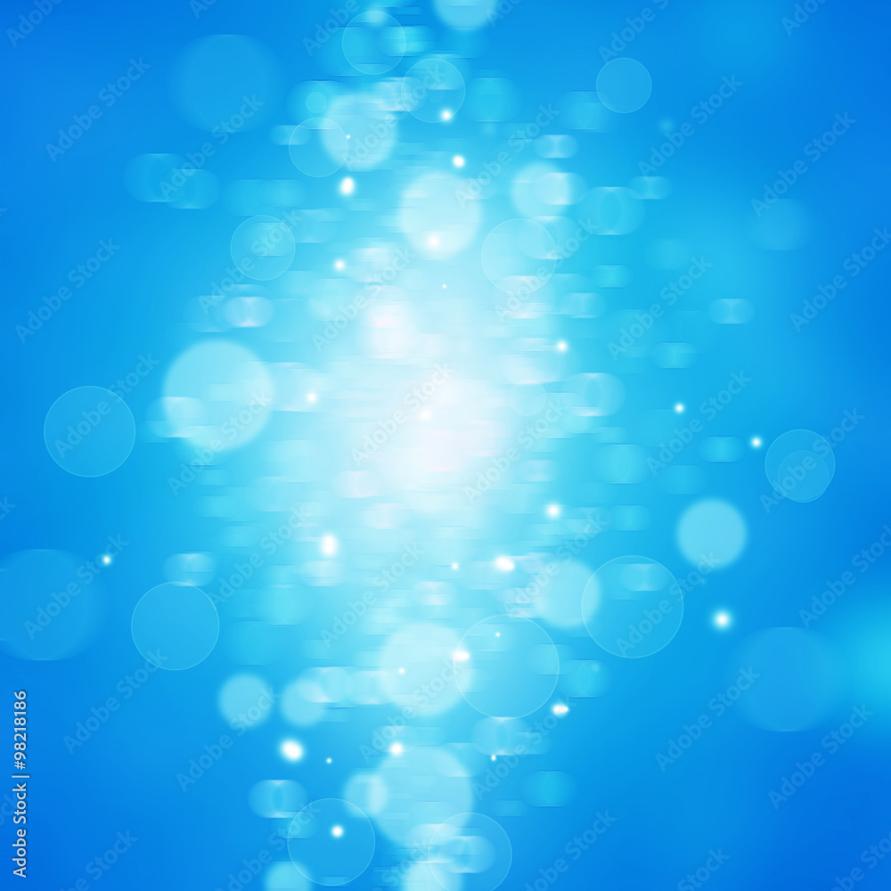 Winter Festive Christmas blue abstract background with bokeh lig