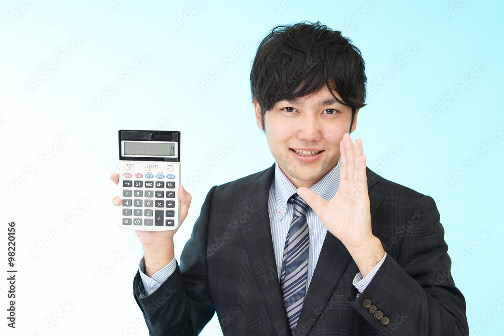 計算機を持つ男性 計算機を持つ男性