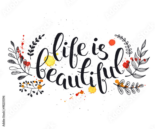 Hand written latin quote. Life is beautiful. Modern calligraphy. Ink phase with watercolor splashes and floral elements isolated on white background. Lettering design for T-shirts and greeting cards.