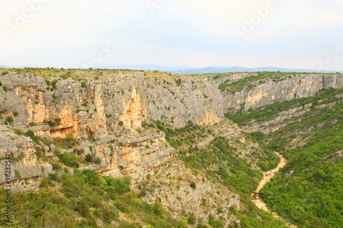 Rocky cliffs and dry river canyon 