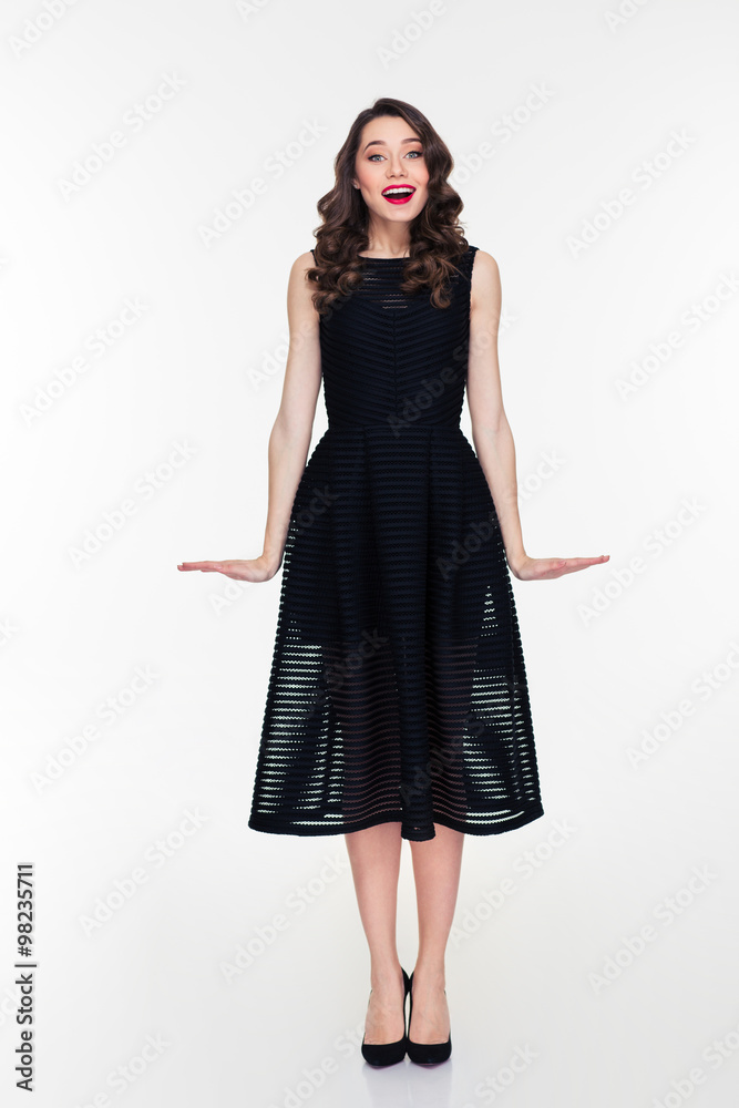 Happy attractive woman in retro style posing over white background Happy attractive woman in retro style posing over white background