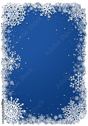Christmas frame with snowflakes over blue background