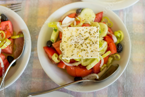 Greek salad on the table in the Greek restaurant