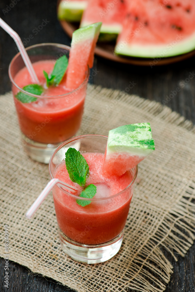 Watermelon drink in glasses with slices of watermelon
