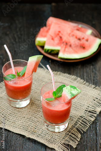 Watermelon drink in glasses with slices of watermelon
