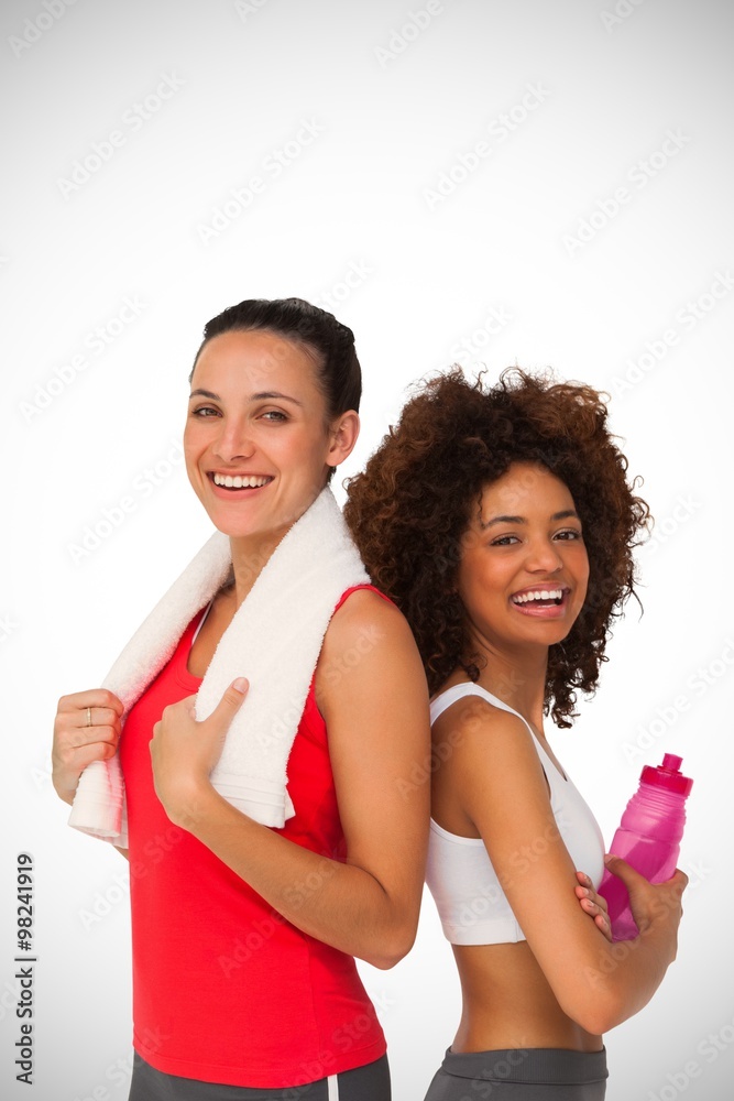 Women standing with waterbottle and towel