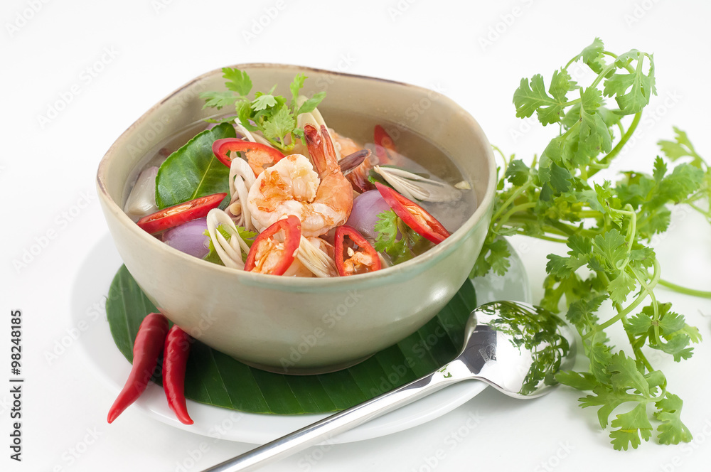 Tom Yam - Thai traditional soup with prawns isolated on white Tom Yam - Thai traditional soup with prawns isolated on white