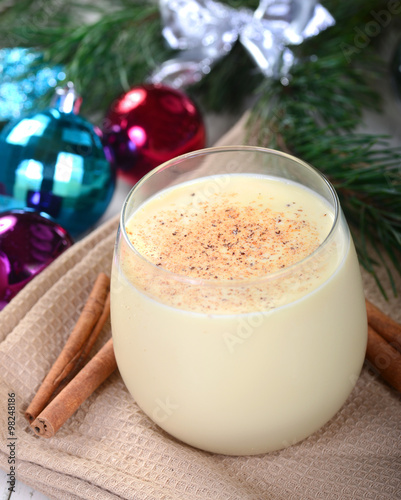 Glass of eggnog in a Christmas setting