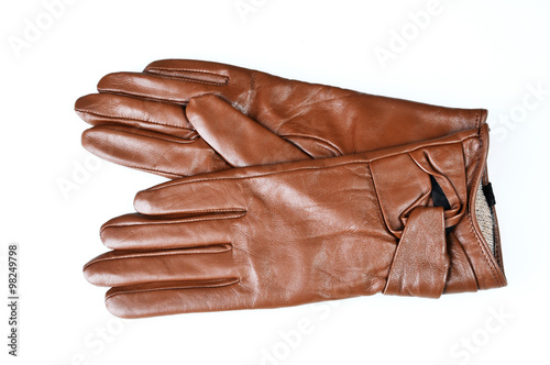 Womens brown leather gloves isolated on white background