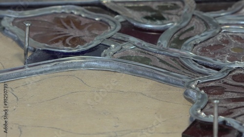 a master glazier rebuilt stained glass