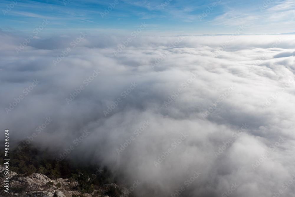 Fototapeta premium über den Wolken - Aerial view of the sky and fog a from a plateau on a mountain.