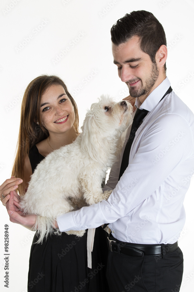 Portrait of happy couple with dog over white background Portrait of happy couple with dog over white background