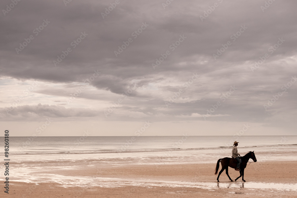 A man riding horse A man riding horse