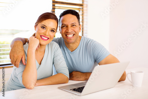couple sitting in dining room at home