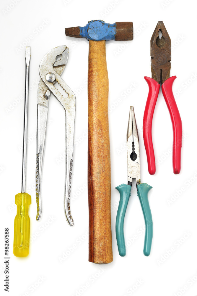 Hand Tools / High resolution image of hammer,screw driver,pliers,on white background shot in studio Hand Tools / High resolution image of hammer,screw driver,pliers,on white background shot in studio