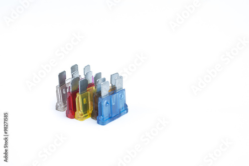 Car fuse. Pile of colorful electrical automotive fuses or circui photo