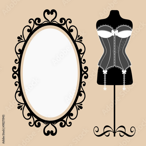 mannequin and corset and a mirror