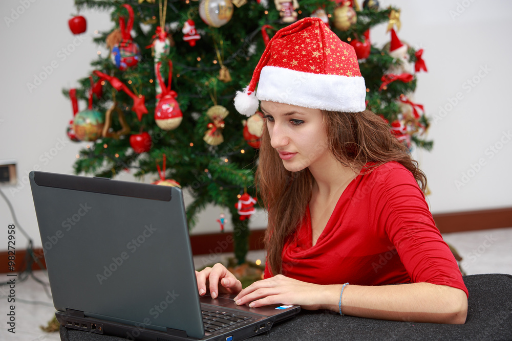 Santa Claus works with the laptop Santa Claus works with the laptop