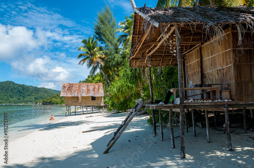 Nipa bamboo Huts at the White Sand beach with palm trees