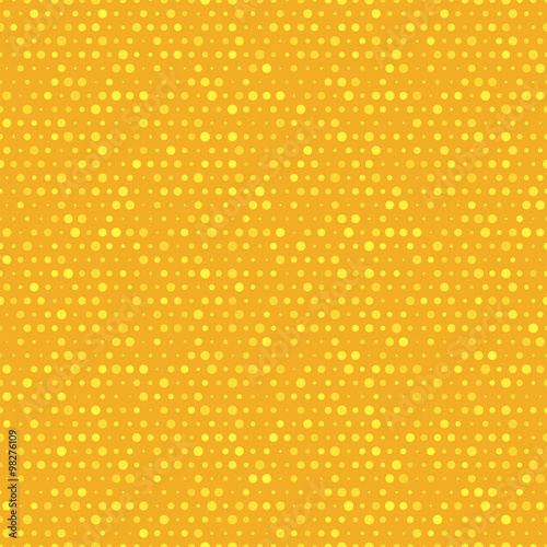 Orange and yellow dotted vector seamless pattern.