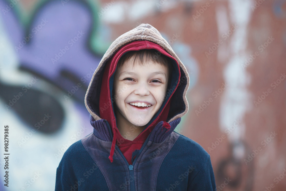 portrait of a little happy homeless boy portrait of a little happy homeless boy