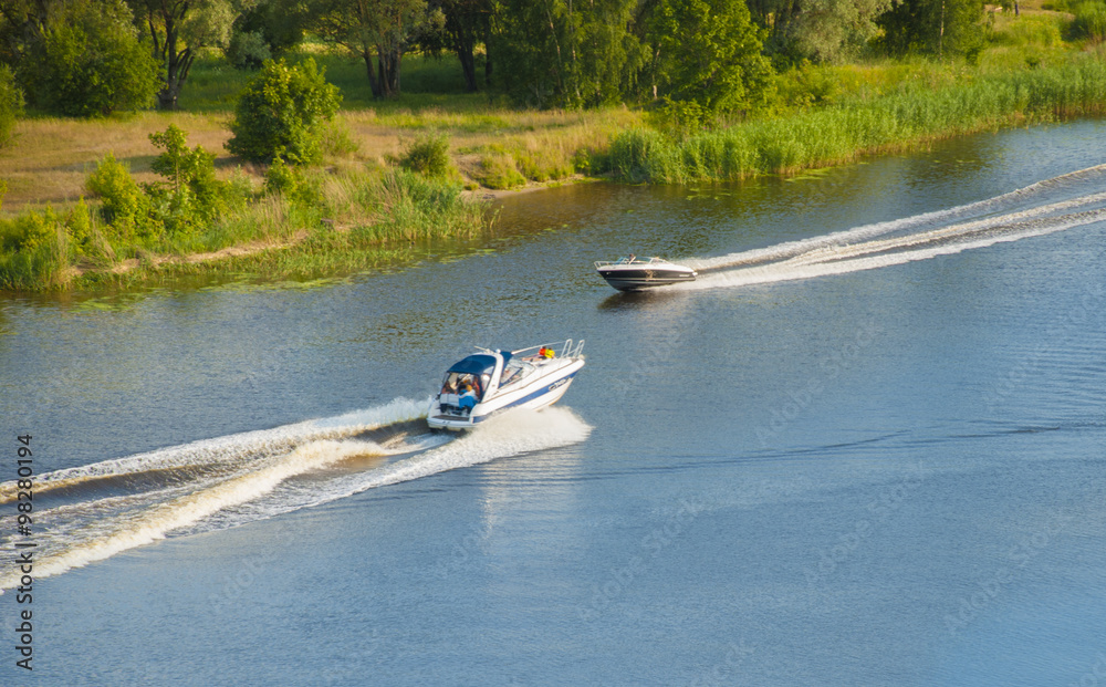 Obraz premium Two motor boats