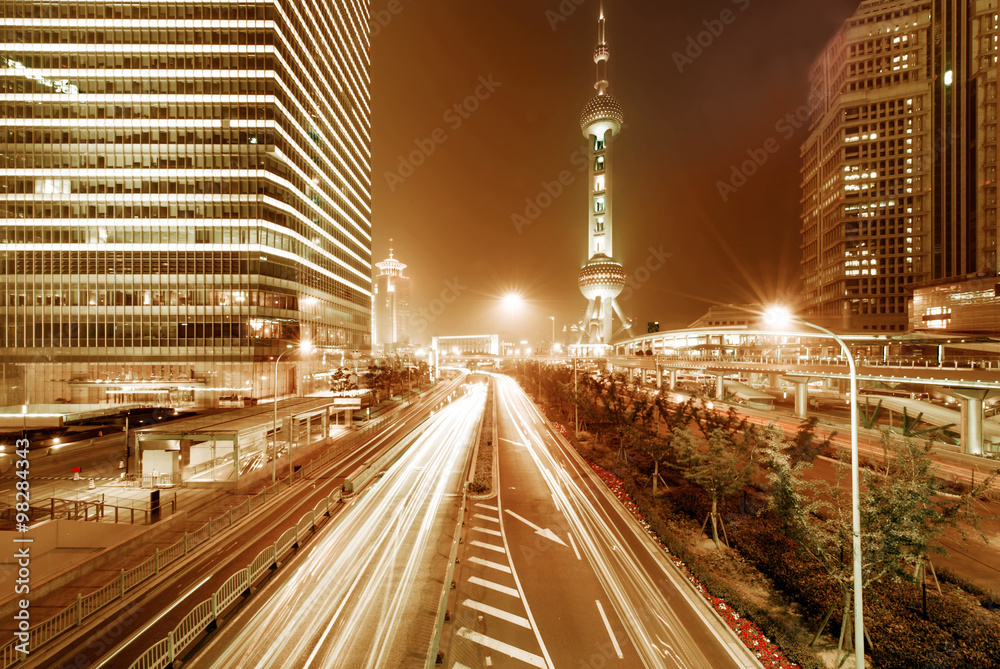 Fototapeta premium light trails on the modern building background in shanghai china