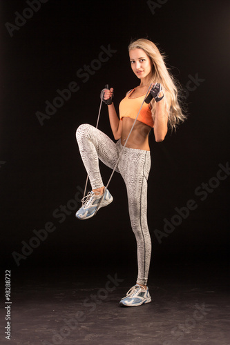 Woman athlete with a skipping rope