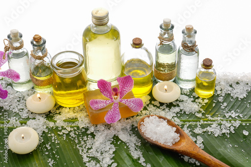 health spa with bottle oil  candle  orchid and banana leaf