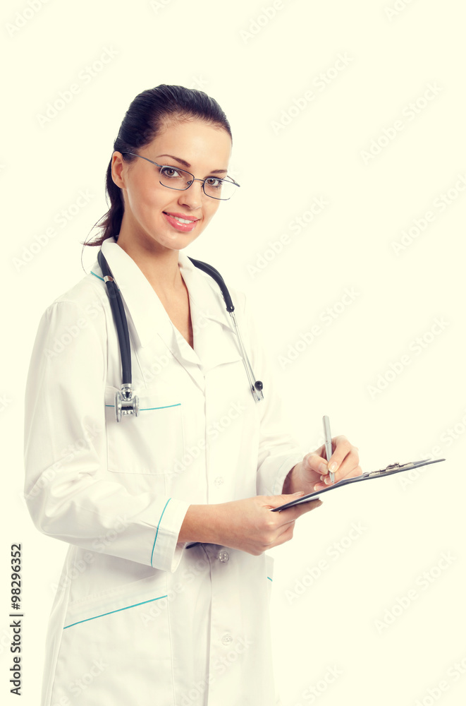 Happy doctor with stethoscope writing on clipboard Happy doctor with stethoscope writing on clipboard