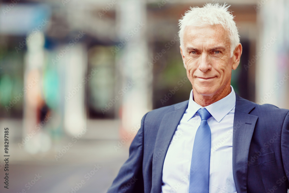 Portrait of confident businessman outdoors