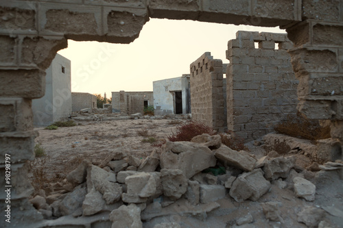 Traditional wall made of sand and coral, Old Ras Al Khaimah abandoned ghost town, Al Jazirah Al Hamra photo