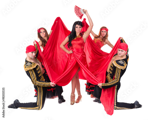 dancer team wearing in traditional flamenco dresses