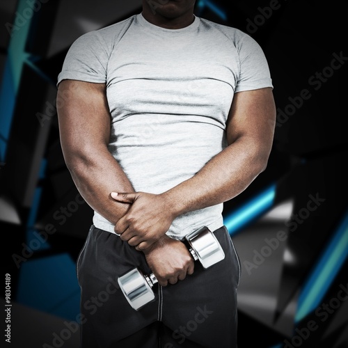 Composite image of fit man exercising with dumbbell