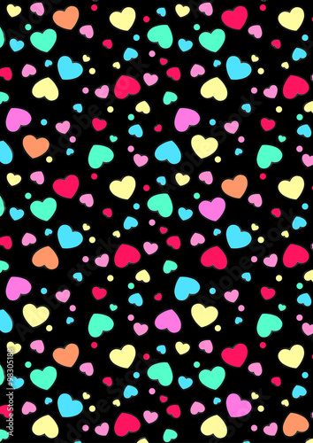Cute colored hearts pattern on a black background
