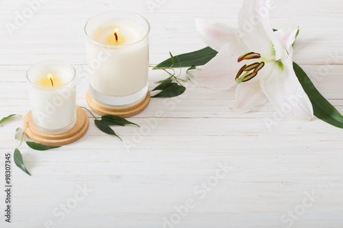 scented candles on white background