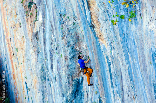 Bright luminous orange blue Rock pattern and Climber