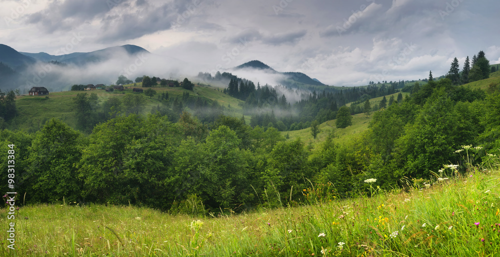 Mountain village during rain. Beautiful natural landscape