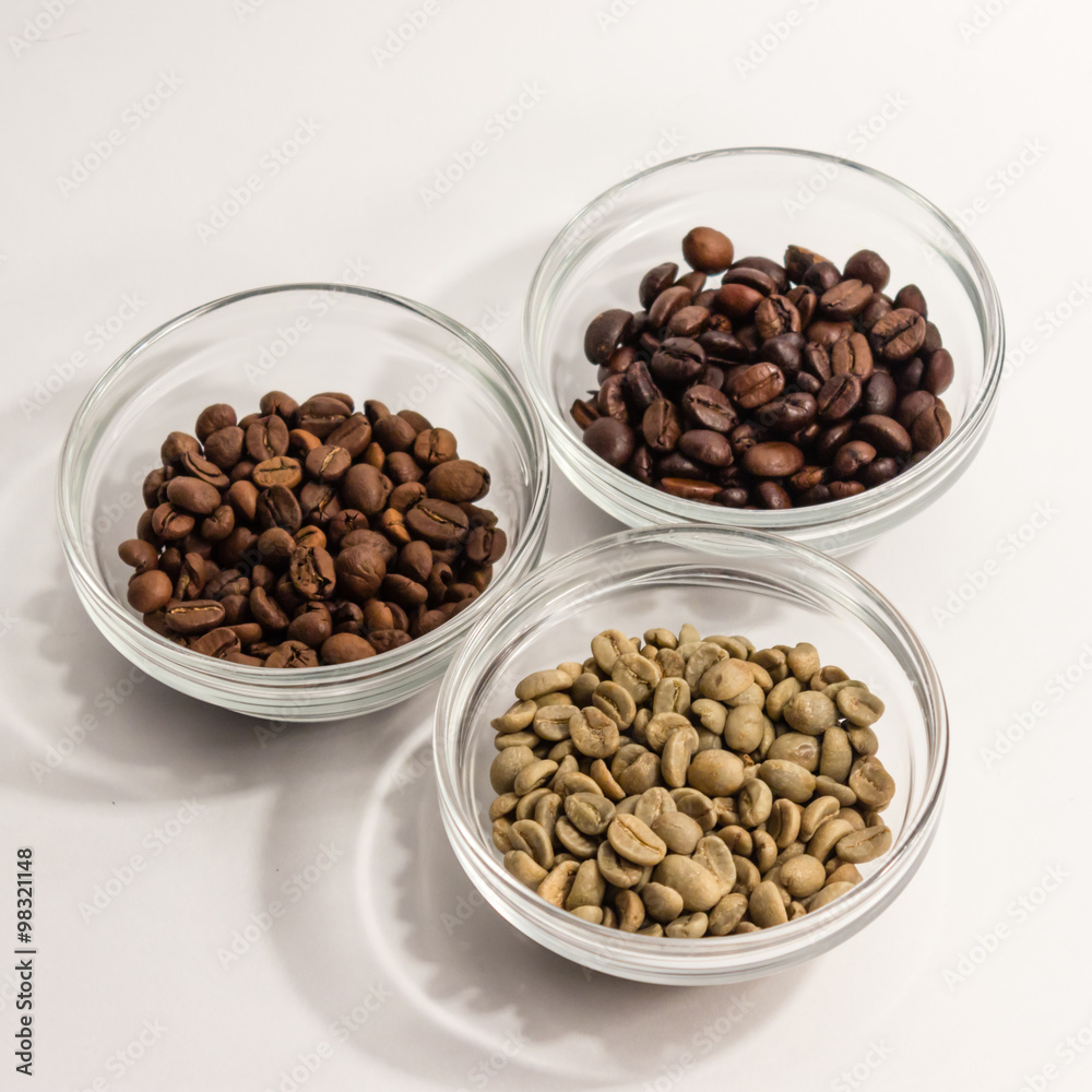 Fototapeta premium Three types of coffee in glass shelves placed in a triangle on a